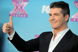 Simon Cowell's next project is a cooking show.Photo / AP