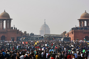 People crowd outside the Presidential Palace as they protest against a brutal gang rape of a 23-year-old student, in New Delhi, India. Photo / AP