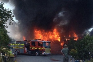 Equipment including a tractor and forklift was destroyed in a $250,00 fire at GardenBarn in Masterton yesterday afternoon. Photo / Supplied