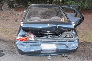 The woman's car was seriously damaged in the incident. Photo / supplied