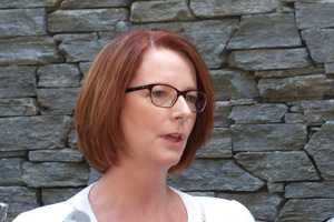 Australian Prime Minister Julia Gillard fronts a large media contingent at the Hilton Queenstown. Photo / Otago Daily Times