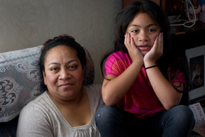 Manu Fotu, with her daughter Achorite, says she couldn't sleep at night after she lost her job. Photo / Sarah Ivey