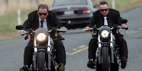 Lotto millionaire Trevor Cooper, left, rode a Harley Davidson Night Rod Special to his wedding, held at his $2 million Karaka home. Photo / Doug Sherring