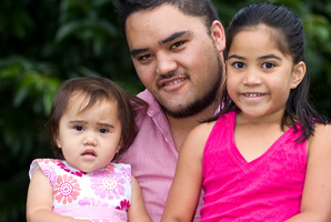 Role model dad Nick Grace cares for his girls, aged 1 and 6. Photo / Michael Craig