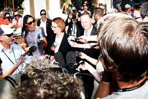 Julia Gillard and John Key answered questions in Queenstown yesterday after laying a wreath at the war memorial. Photo / Getty Image