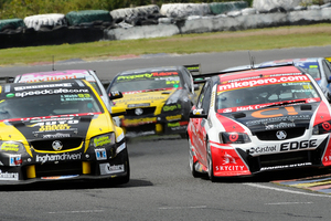 V8 SuperTourer drivers Greg Murphy and Scott McLaughlin do battle. Photo / Geoff Ridder