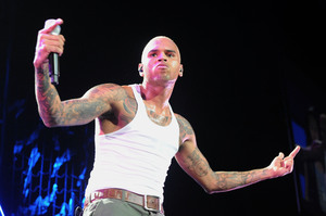 Chris Brown claims he was cut off by aggressive paparazzi. Photo / AP