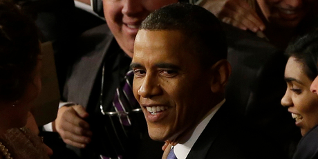 President Barack Obama challenged Congress to pass laws to overhaul the immigration system and clamp down on military-style guns. Photo / AP