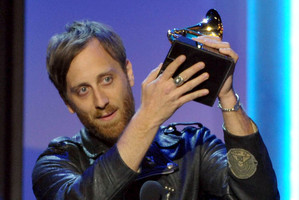 Dan Auerbach accepts the award for producer of the year non-classical during the pre-telecast at the 55th annual Grammy Awards. Photo / AP