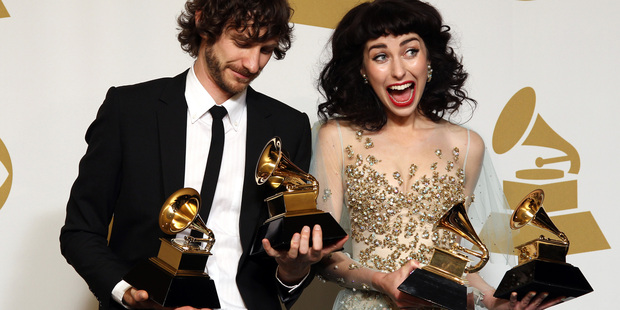 Gotye, left, and Kimbra pose backstage with the awards for best pop duo/group performance of the year and record of the year for 'Somebody That I Used to Know'. Photo / AP