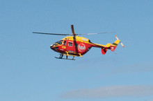 A Westpac Rescue Helicopter says the injured man was fortunate not to be thrown from the bulldozer cab during its fall. File photo / Herald on Sunday A Westpac Rescue Helicopter says the injured man was fortunate not to be thrown from the bulldozer cab during its fall. File photo / Herald on Sunday