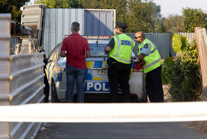 Police at the scene of the assault in Napier. Photo / Warren Buckland