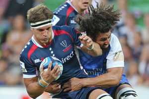 Luke Jones of the Rebels is tackled during the round one Super Rugby match between the Rebels and the Force. Photo / Getty Images.