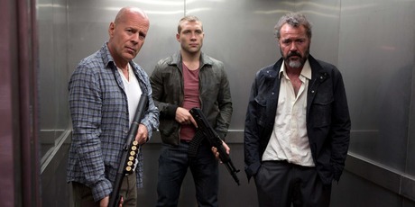Bruce Willis, left, Jai Courtney, and Sebastian Koch in A Good Day To Die Hard. Photo/AP