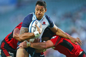 Israel Folau takes on the Crusaders defence. Photo / Getty Images