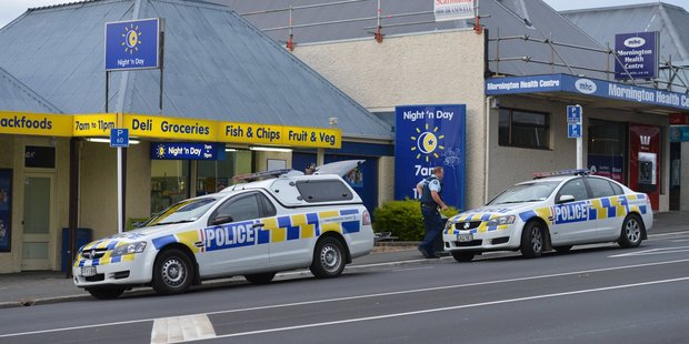 Police at the Mornington Night 'n Day after yesterday's armed robbery. Photo / Stephen Jaquiery