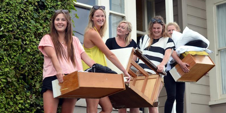 Moving stored items from last year's flat on Dundas St are University of Otago students, all of New Plymouth. Photo / Stephen Jaquiery