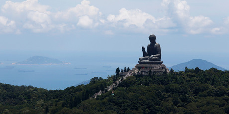 Tian Tan Buddha, a large bronze statue of a Buddha Amoghasiddhi, is seen on Lantau Island, a popular tourist spot in Hong Kong. Photo / AP