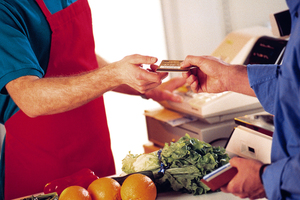 Companies wanting to keep customers happy (or at least not feeling plundered) should charge a simple percentage that is close to the 1-2% they pay for the service. Photo / Thinkstock