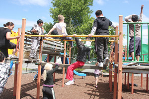 Pupils use the playground at Phillipstown School in Christchurch, which is set to merge with Woolston School in January, 2013. Photo / File photo
