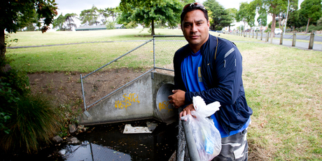 Tamati Patuwai beside the Omaru Creek in Glen Innes. Photo / Dean Purcell