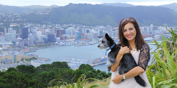 Writer Sharon Stephenson, back in Wellington, with her dog, Bristol. Photo / Martin Haughey
