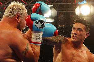 Sonny Bill Williams punches Francois Botha during their heavyweight bout. Photo / Getty Images