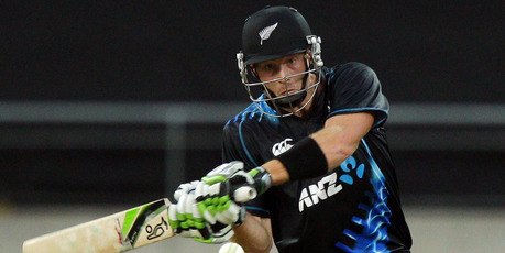 An injured Martin Guptill celebrates victory against England. Photo / Getty Images