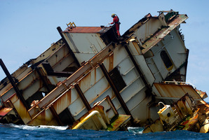 Insurers and owners want to turn the Rena wreck into a dive site, but most locals want it gone. Photo / Alan Gibson