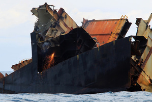Work on cutting up the Rena continues. Photo / Bay of Plenty Times