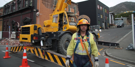 Alastair Suren of the Lyttelton Volunteer Fire Brigade at work after the 22 February quake. Photo / Supplied