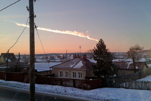 The meteorite contrail is seen over a vilage of Bolshoe Sidelnikovo 50 km of Chelyabinsk. Photo / AP