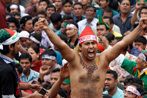 A Bangladeshi activist gets fired up during a protest in the capital, Dhaka. Photo / AP