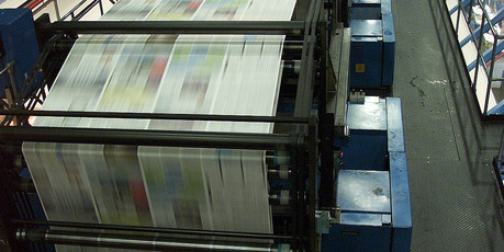 Sections of the New Zealand Herald, which is owned by APN News & Media, being printed in Auckland. Photo / Peter Meecham