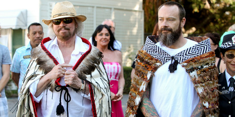 Barry Gibb and his son Stephen after they were adorned with korowai (cloaks) before a Maori welcome. Photo / Glenn Taylor