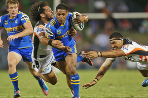 Chris Sandow of the Eels makes a break during the NRL trial match against the Wests Tigers. Photo / Getty Images