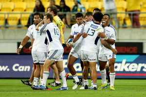 Blues players celebrate Charles Piutau's try. Photo / Getty Images