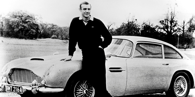 Sean Connery in the 1964 film Goldfinger with the Aston Martin DB5. Photo / Supplied