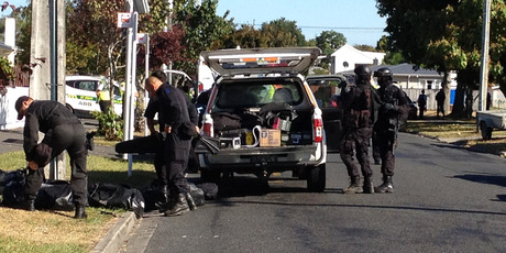 The Armed Offenders Squad attends a stand-off in Glenview, Hamilton. Photo / Christine Cornege