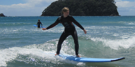 Rachel Grunwell tries a surfing lesson at Mount Maunganui. Photo / Supplied