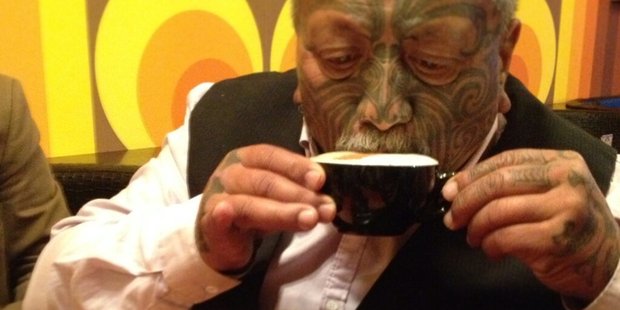 Tame Iti enjoys a cappuccino on his first day after being released from prison. Photo / Twitter