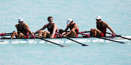 Nathan Cohen, Nathan Flannery, Fergus Fauvel and Hayden Cohen celebrate their victory in the quadruple sculls. Photo / Getty Images