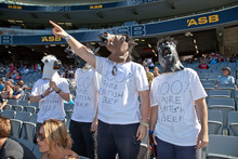 One fan was ejected for trying to start a Mexican wave, while several were thrown out for making darts out of paper '4/6' signs. Photo / Neville Marriner One fan was ejected for trying to start a Mexican wave, while several were thrown out for making darts out of paper '4/6' signs. Photo / Neville Marriner