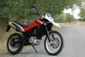 The Husqvarna TR650 Terra's enduro-style front deflects wind nicely, the dirtable riding position is cruiser-comfy. Photo / Jacqui Madelin