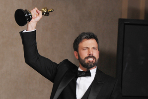 Ben Affleck poses with his award for best picture for Argo. Photo / AP