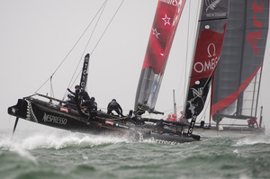 Emirates Team New Zealand in pre race manouvers with Artemis Racing Red in 2012. Photo / Chris Cameron