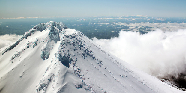 Mount Taranaki's near-perfect cone offers a tempting challenge to climbers. It's a test of perseverance, and very satisfying to conquer. Photo / Supplied