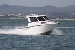 Okelani is a custom-built Bluewater 7.7 Weekender, which features twin king/queen seats, a lockable cabin and a handy cooker in the hardtop. Photo / Supplied