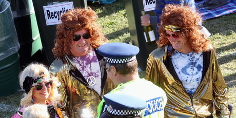 Even the patrolling police were impressed by these disco lads and their equally glittering companions. Photo / Paul Taylor