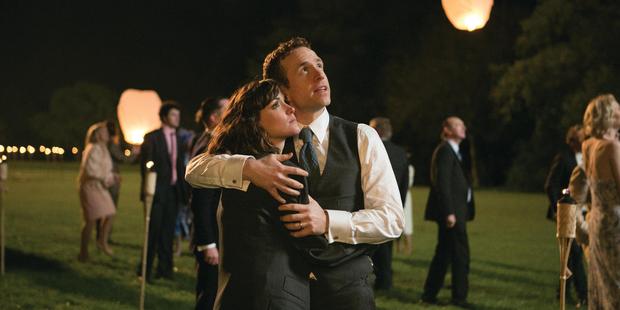 Nat (Rose Byrne, left) and Josh (Rafe Spall) at their wedding, in a scene form I Give It A Year. Photo / Supplied